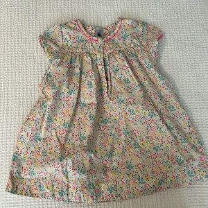 Petite Bateau dress. Size 24 months. Snap buttons and all over floral print. New
